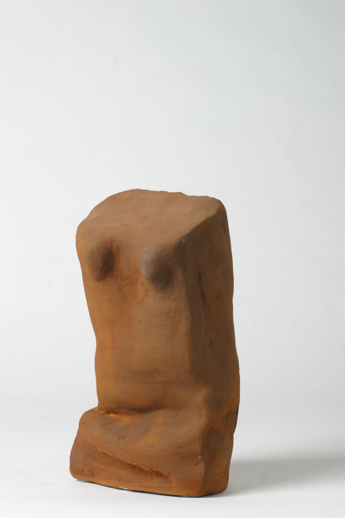 Plastik aus. braunem Ton, Torso
